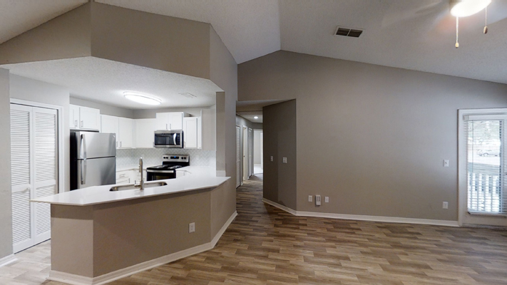 newly renovated apartments with open living room, dining room and kitchen