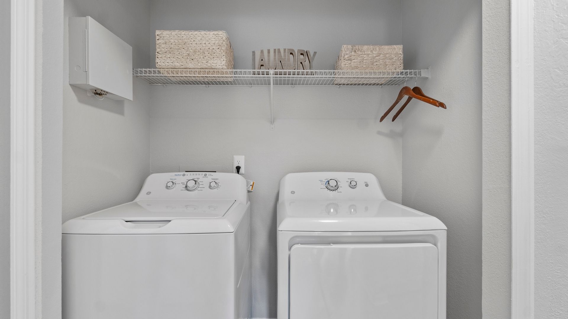 new washer and dryer in laundry room