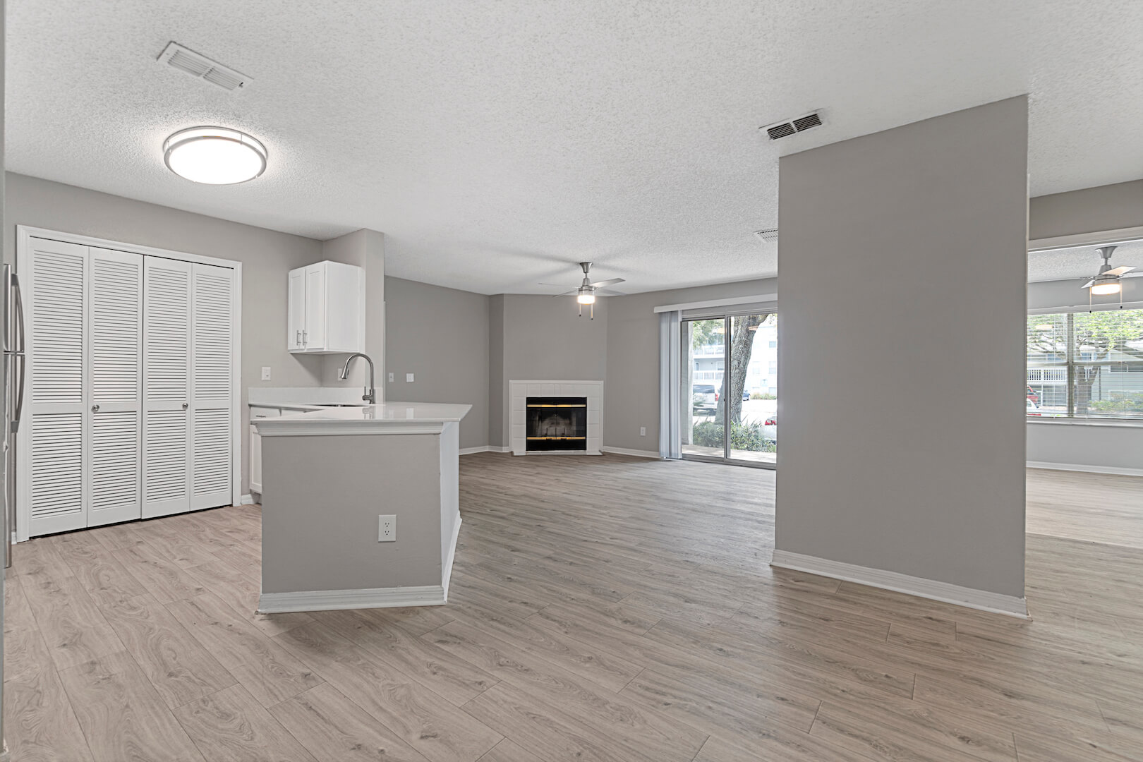 view showing open style apartment layout kitchen, living room and dining room